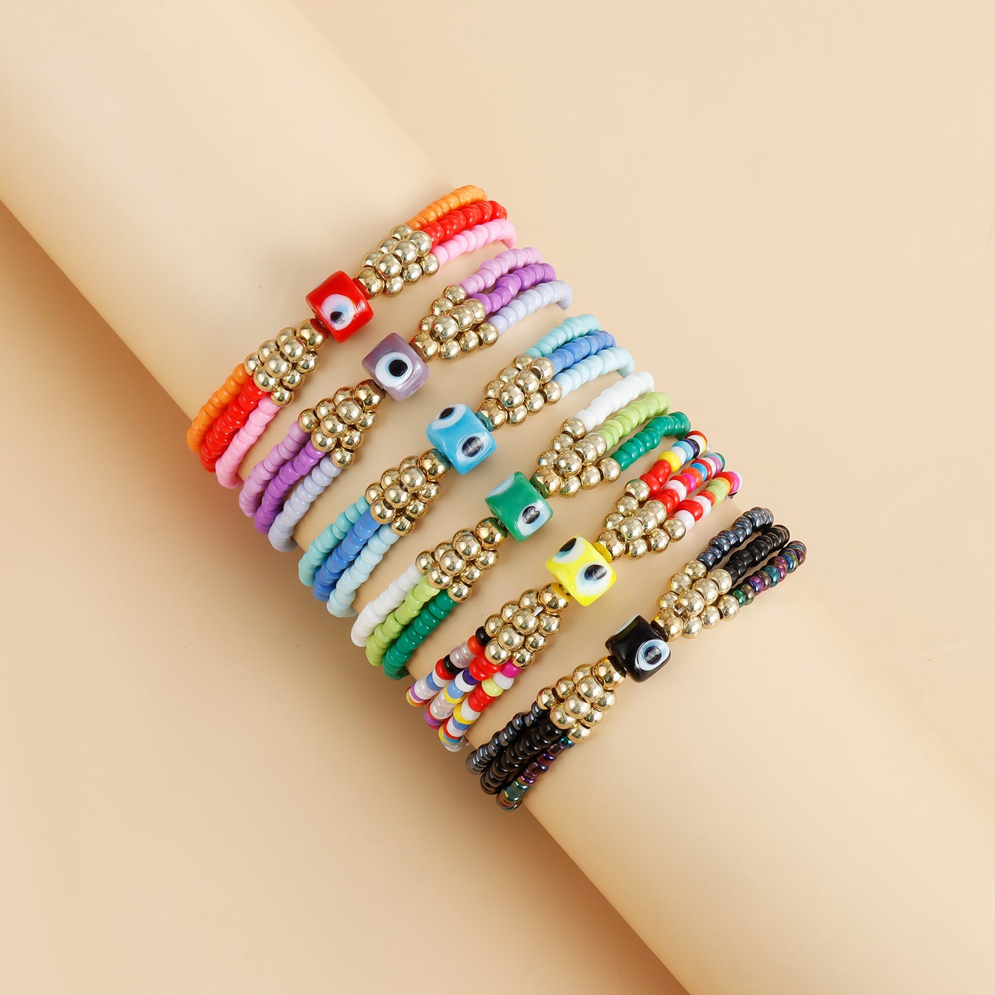 Elegante bracciale da donna in metallo galvanizzato a forma di occhio con intreccio di perline colorate
