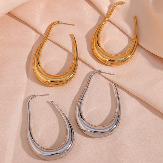 Pendientes de aro curvos huecos de acero inoxidable geométricos minimalistas chapados en oro de 18 quilates para mujer