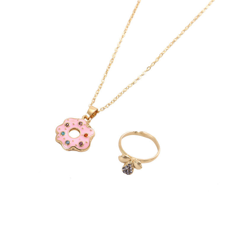 Set di collane in lega a forma di fiore e ciambella in stile cartone animato per bambini con finitura in smalto e catena a croce