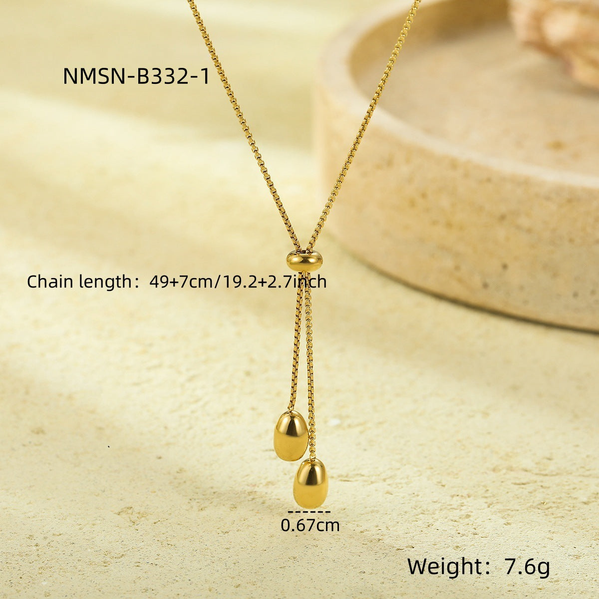 Collar minimalista con colgante de gota de acero de titanio tono frío con baño de oro para mujer