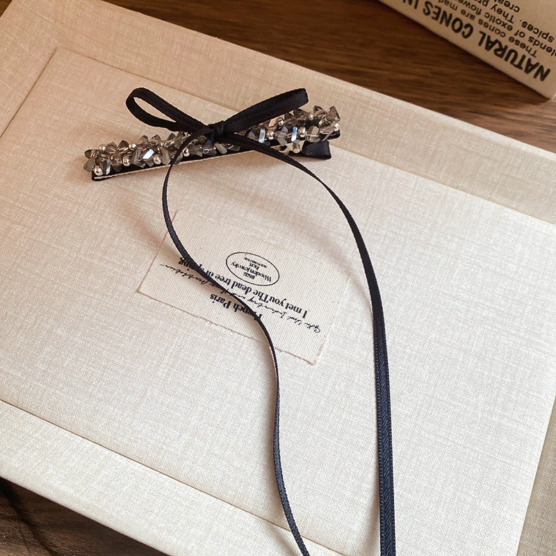 Pinza de pelo de aleación de estilo de lujo con forma de lazo y adornos de pedrería para mujer con detalles de perlas y diseño chic minimalista