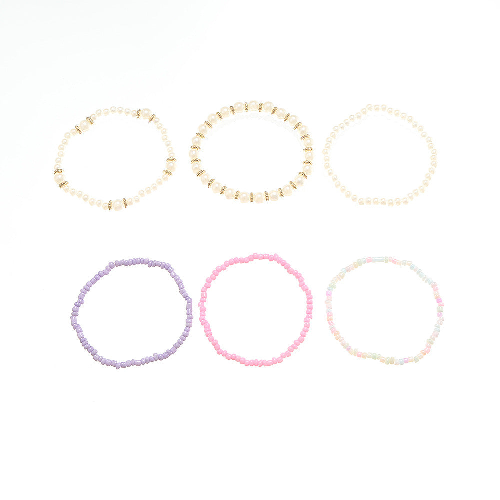 Set de pulseras de cuentas de cristal geométricas minimalistas para niñas en colores pastel rosa y morado