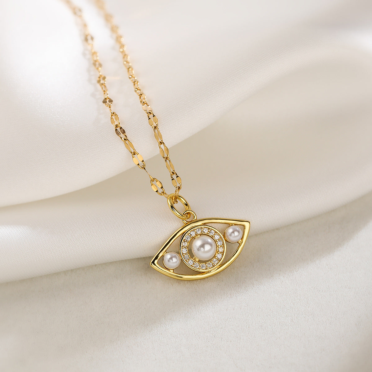 Collana con ciondolo minimalista a occhio di Allah geometrico da donna con base in rame placcata in oro vero e intarsio in zirconi