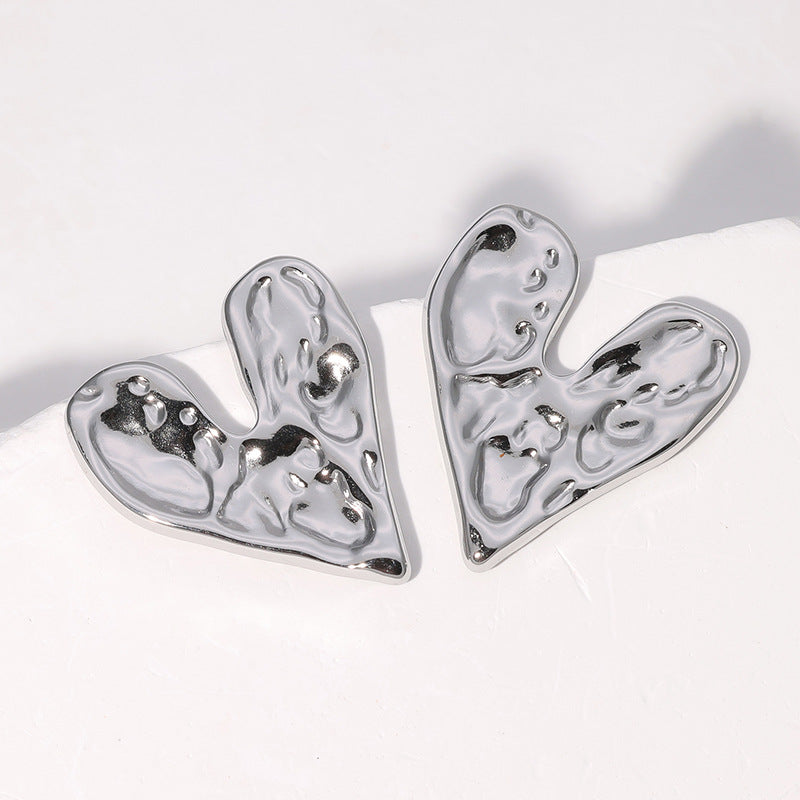 Orecchini a perno minimalisti a forma di cuore in acciaio inossidabile con finitura placcata da donna
