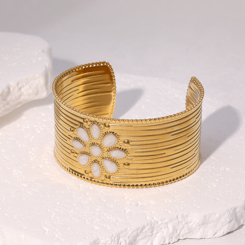 Minimalist Sun Symbol Bracelet for Women in Stainless Steel with 18K Gold Plating and Adjustable Open Bangle Design