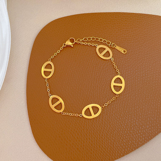 Minimalist Vintage Titanium Steel Zodiac Bracelet for Women and Men with Four-Season Bean and Water Ripple Pattern
