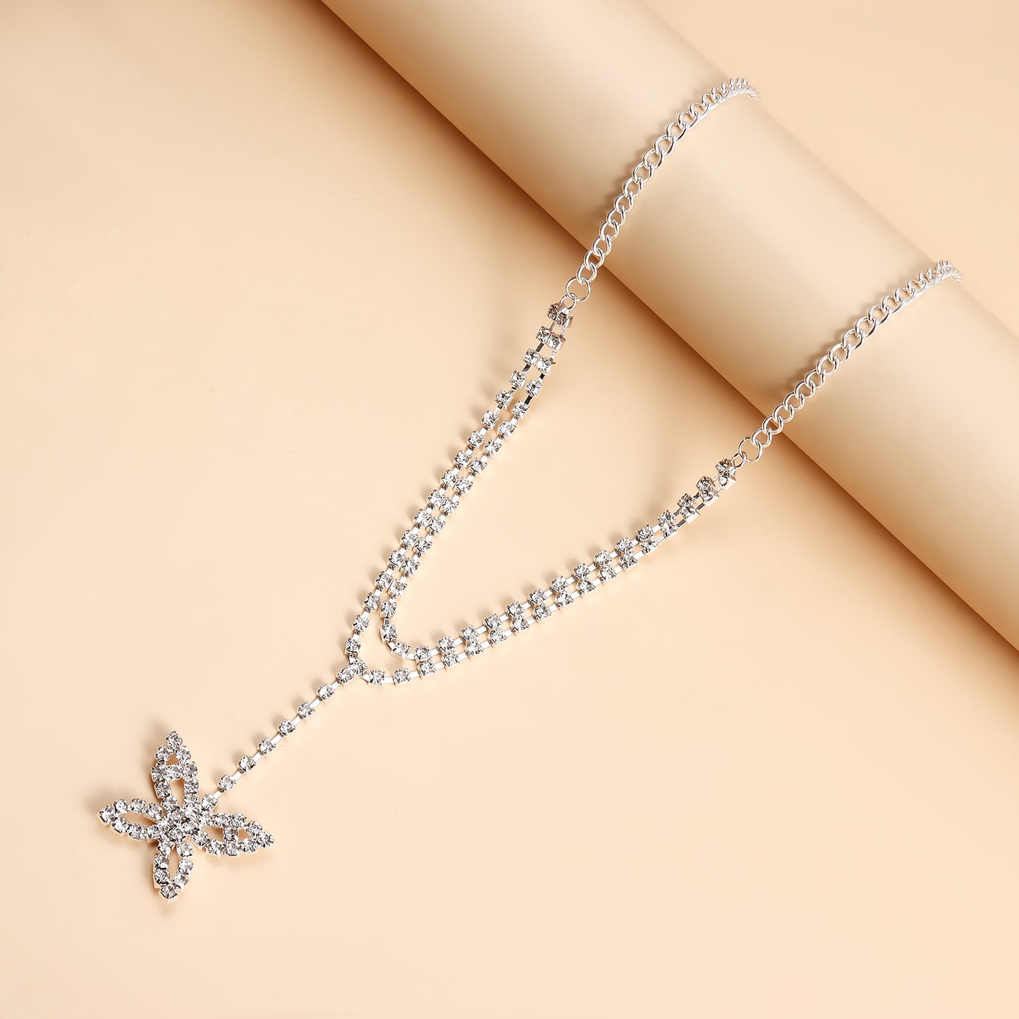 Sweet and Edgy Rhinestone Bow Pendant Necklace with Plated Metal Chain for Women