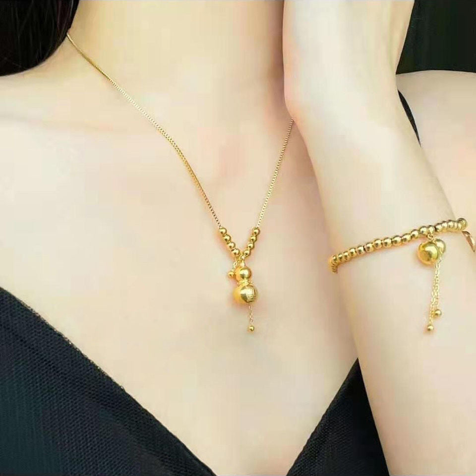 Collana con ciondolo a zucca a perline rotonde con carattere Fu in stile cinese minimalista, in acciaio al titanio placcato oro, unisex