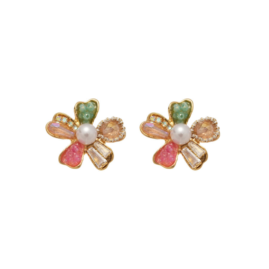 Elegantes aretes de flor con cristales y postes de acero enchapado para mujer