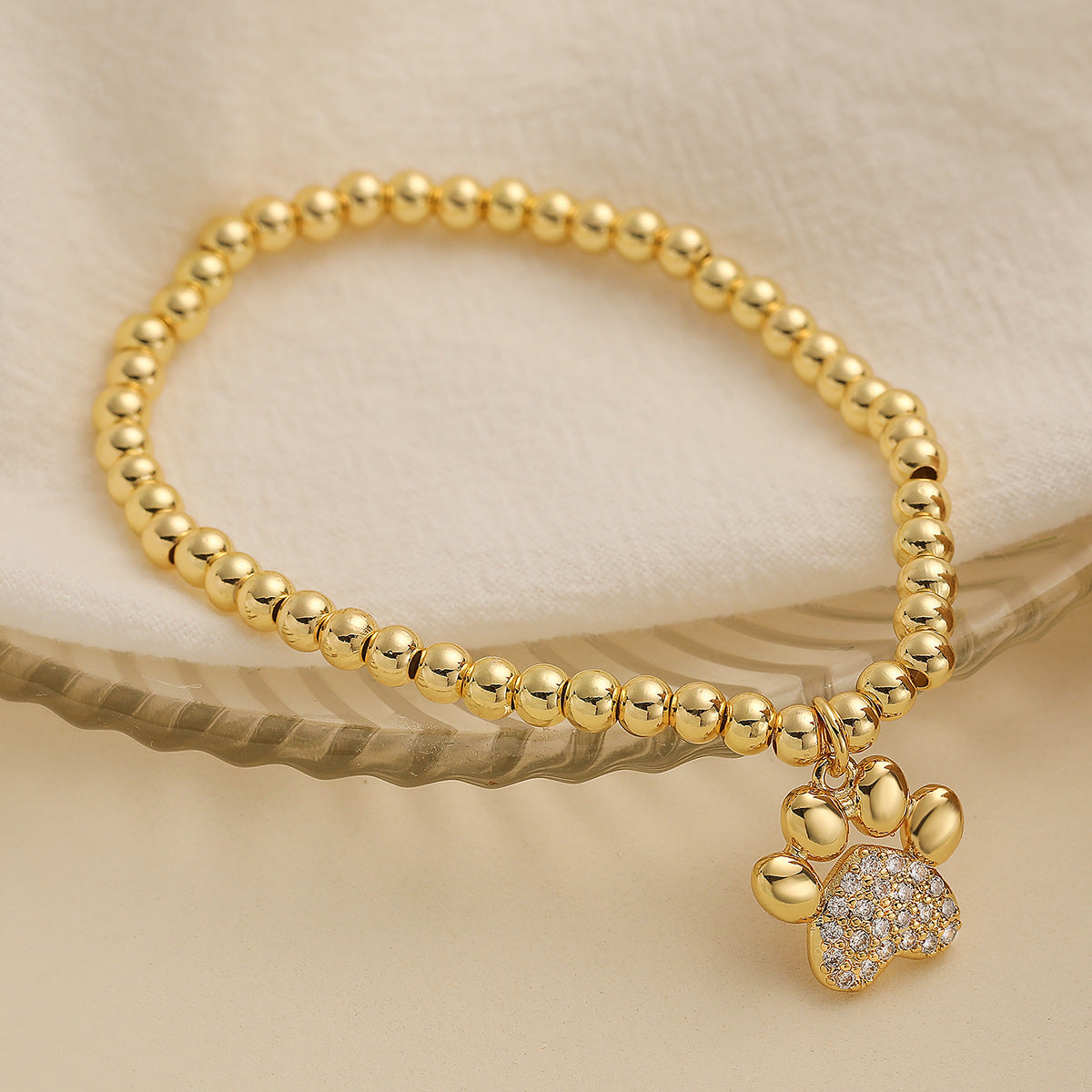 Fashionable Micro-Set Cubic Zirconia Dog Paw Pendant Copper Bracelet with 18K Gold Plating for Women
