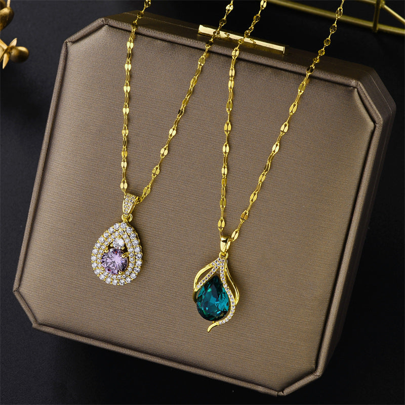 Collana in Acciaio al Titanio a Goccia Stile Naturale con Intarsi di Cristallo e Motivo a Concha