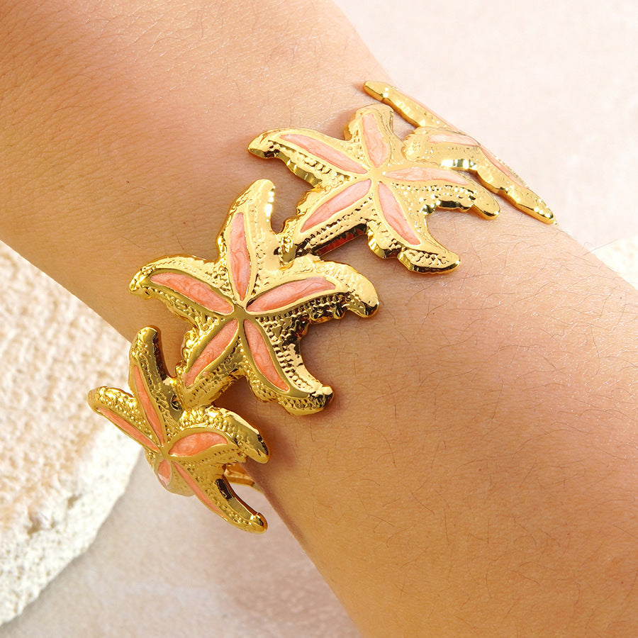 Elegante Bracciale a Polsino in Acciaio Inossidabile con Stella Marina e Goccia d'Olio