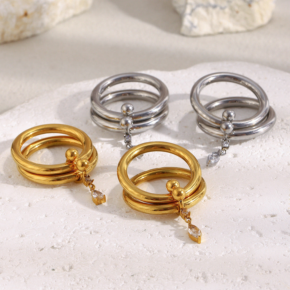Anillo Minimalista de Acero Inoxidable Geométrico con Chapado en Oro de 18K y Circonita Cúbica en Forma de Marquesa
