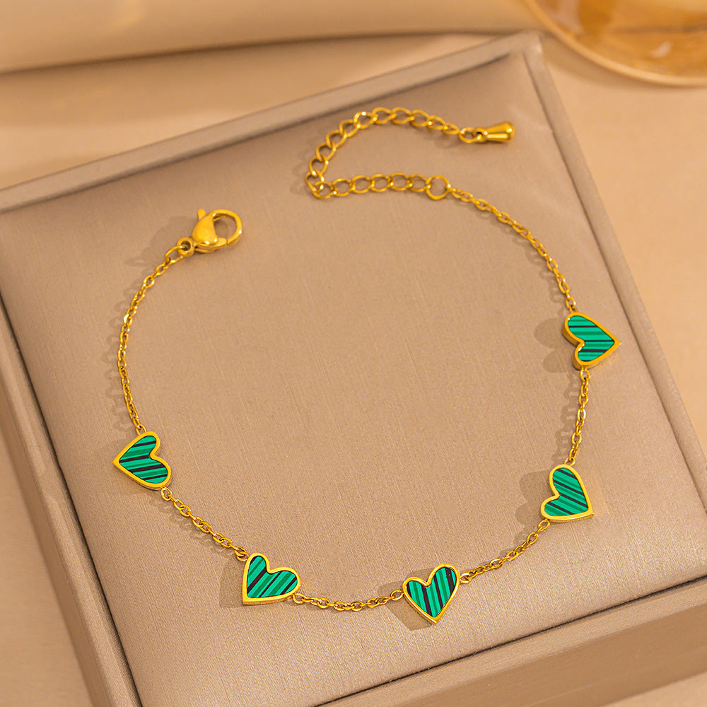 Pulsera minimalista de lujo ligero con forma de corazón de acero de titanio con PVD y oro blanco de 18 quilates y nácar para mujer