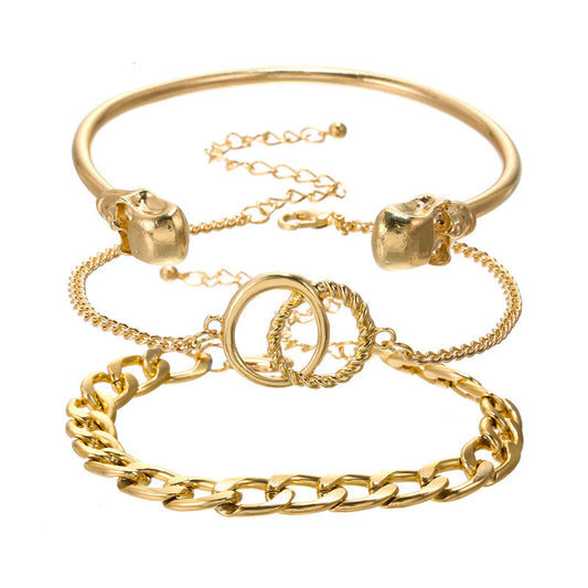 Set di bracciali geometrici minimalisti in lega con finitura placcata da donna, caratterizzati da teschio e design audace hip-hop