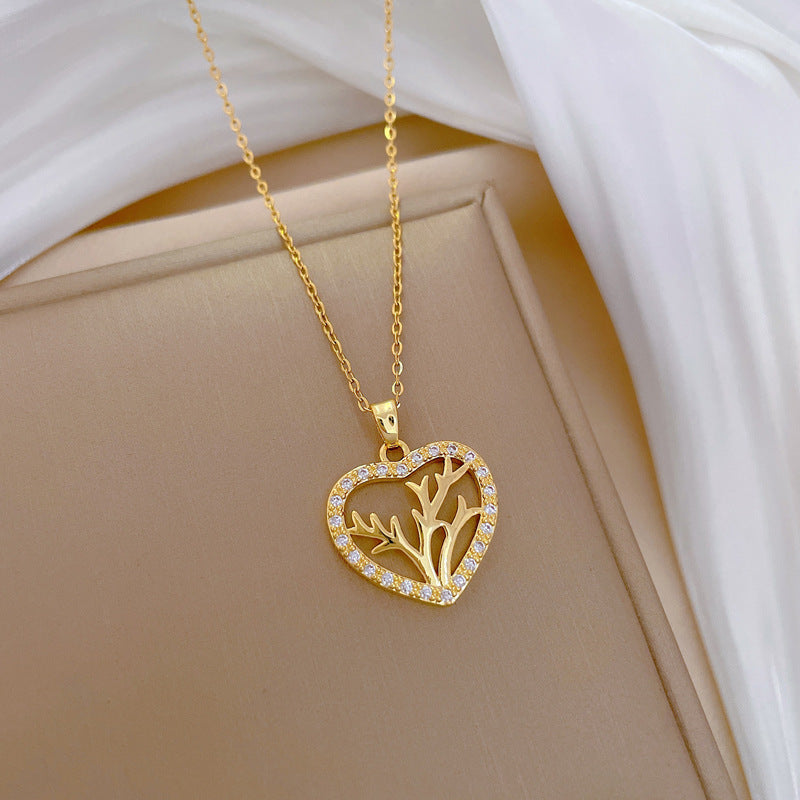 Collana con ciondolo minimalista a cuore e corno in acciaio inossidabile con strass per donna e uomo