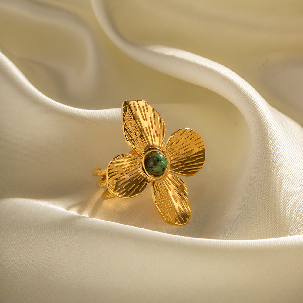 Anello appariscente con fiore a quattro petali, stile palazzo francese, finitura opaca, intarsio in turchese africano, fascia regolabile aperta, design di gioielli elegante da donna