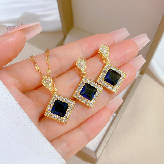 Set collana e orecchini a rombo blu geometrico in acciaio al titanio di lusso per donna per eventi formali