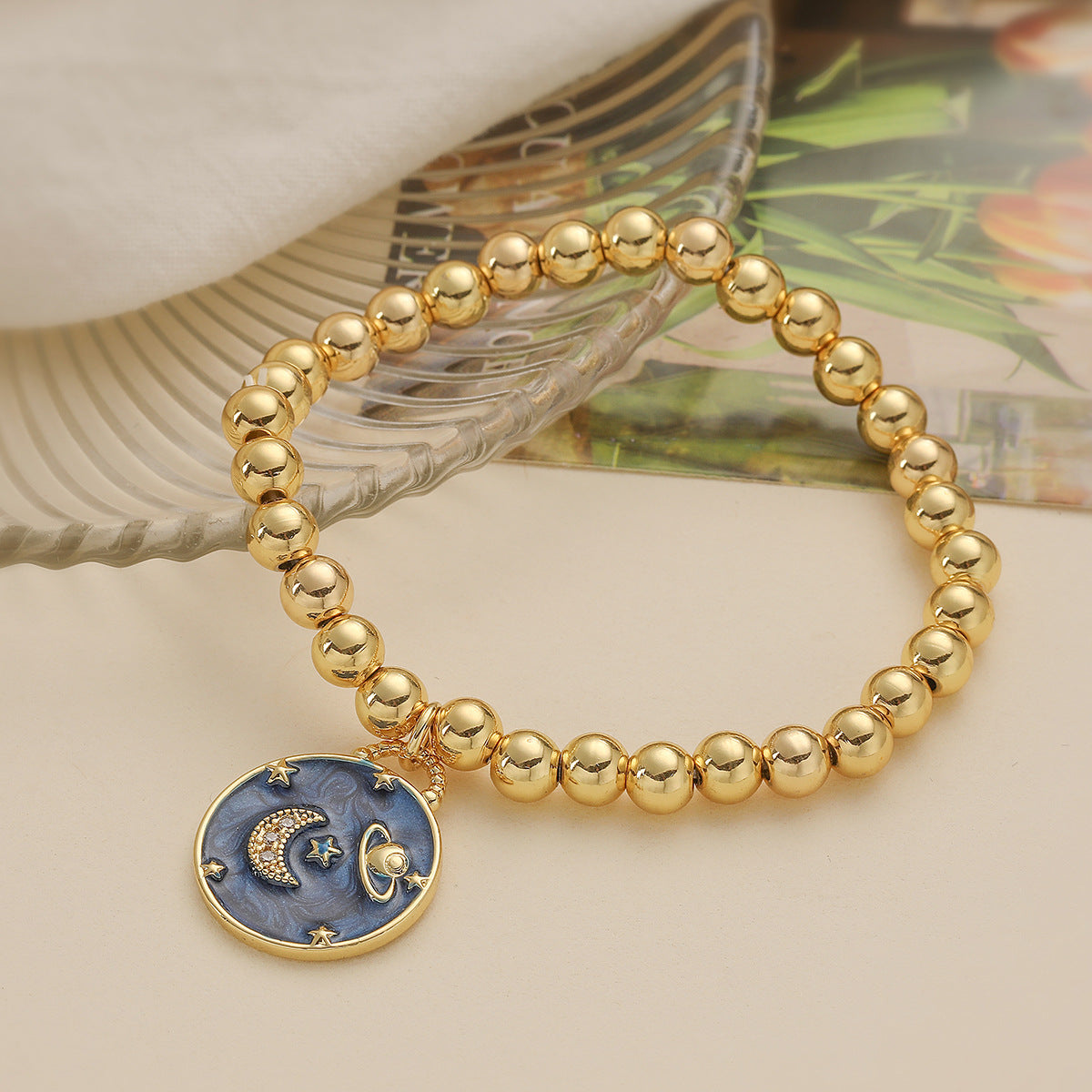 Pulsera de Cobre con Colgante de Sol, Luna, Aceite Caído, Circones y Baño de Oro de 18K para Mujer