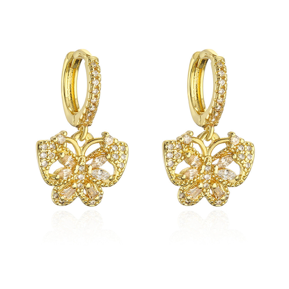 Orecchini a farfalla alla moda in rame placcati oro 18 carati con intarsio di zirconi per donna
