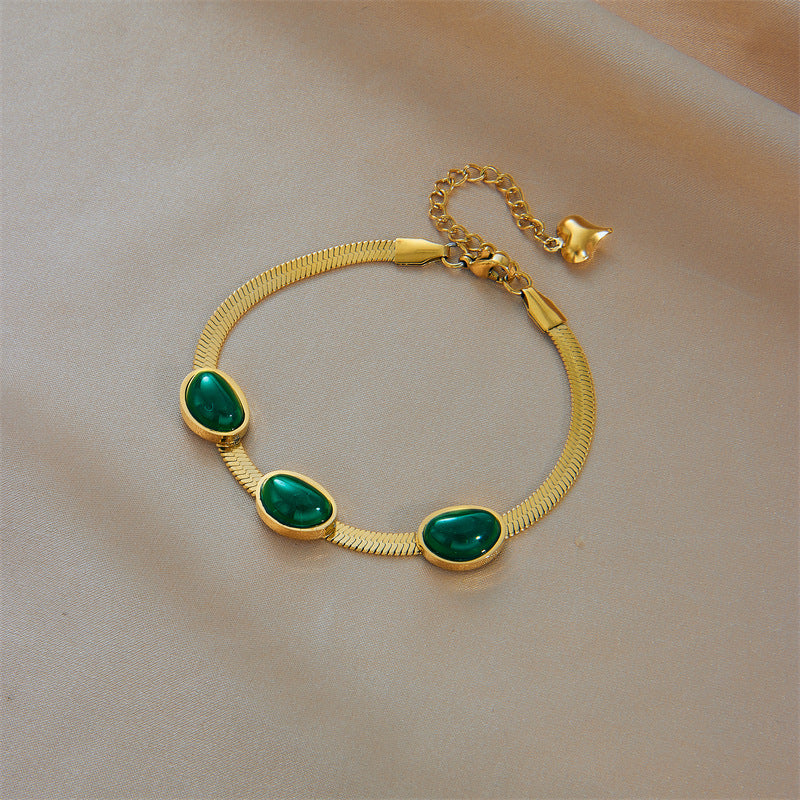 Set collana girocollo e bracciale in acciaio al titanio, stile vintage, maglia a serpente, colore verde smeraldo, placcato oro, monopasto