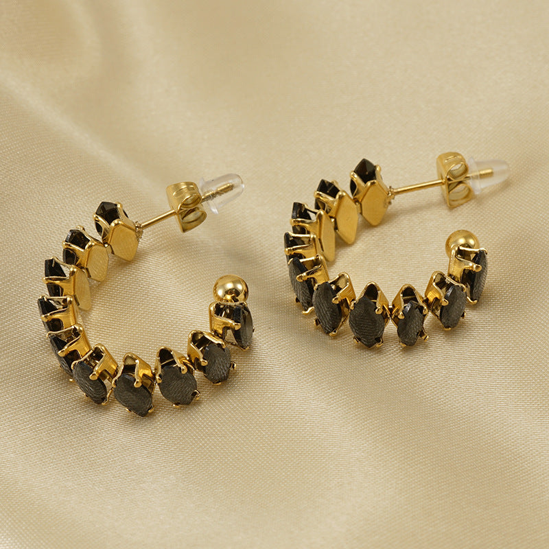 Orecchini a perno da donna alla moda geometrici in acciaio al titanio placcato oro 18K con zirconi