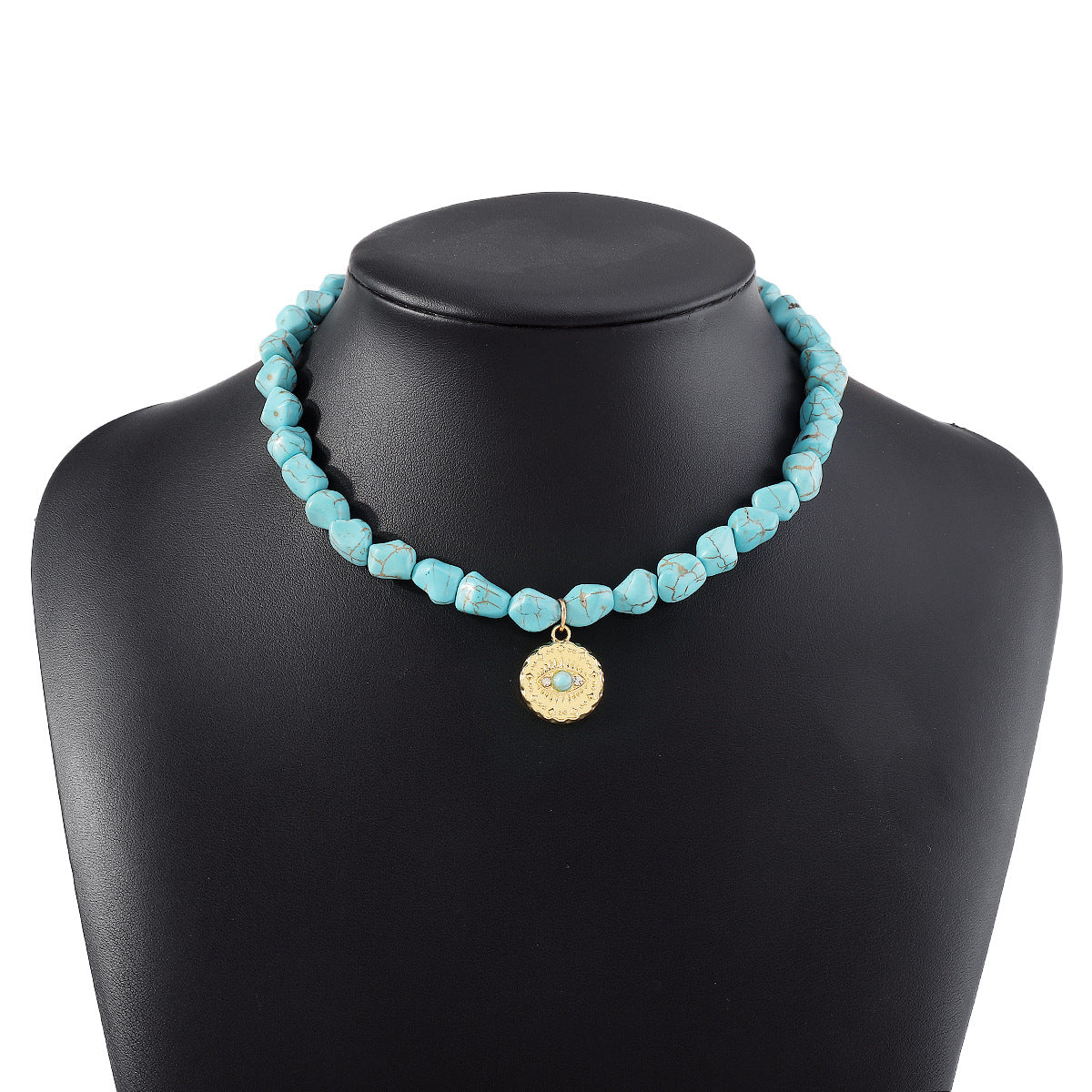 Collana con ciondolo in stile bohémien con occhio di Allah turchese e lega con forme geometriche e a cuore per donna