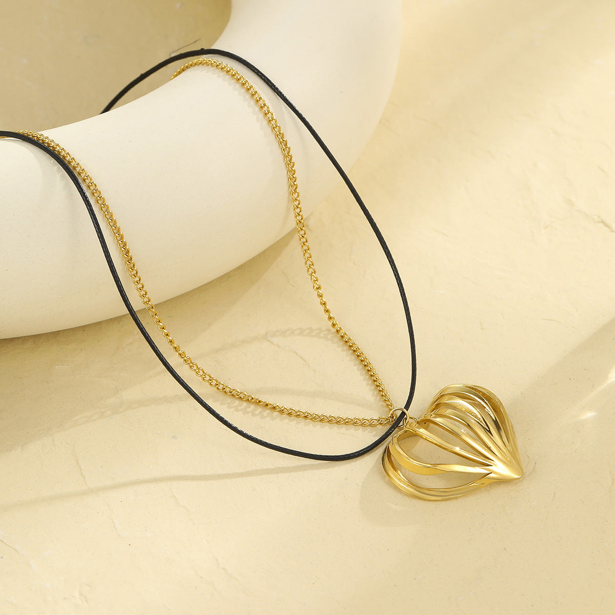 Minimalist Heart-Shaped Hollow-Out Stainless Steel Necklace with 18K Gold Plating for Women