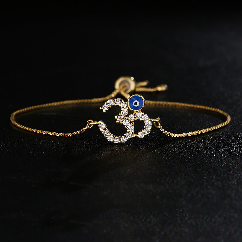 Bracciale da donna regolabile a catena in rame con placcatura in oro 18 carati e zirconi micro-pavé, design geometrico