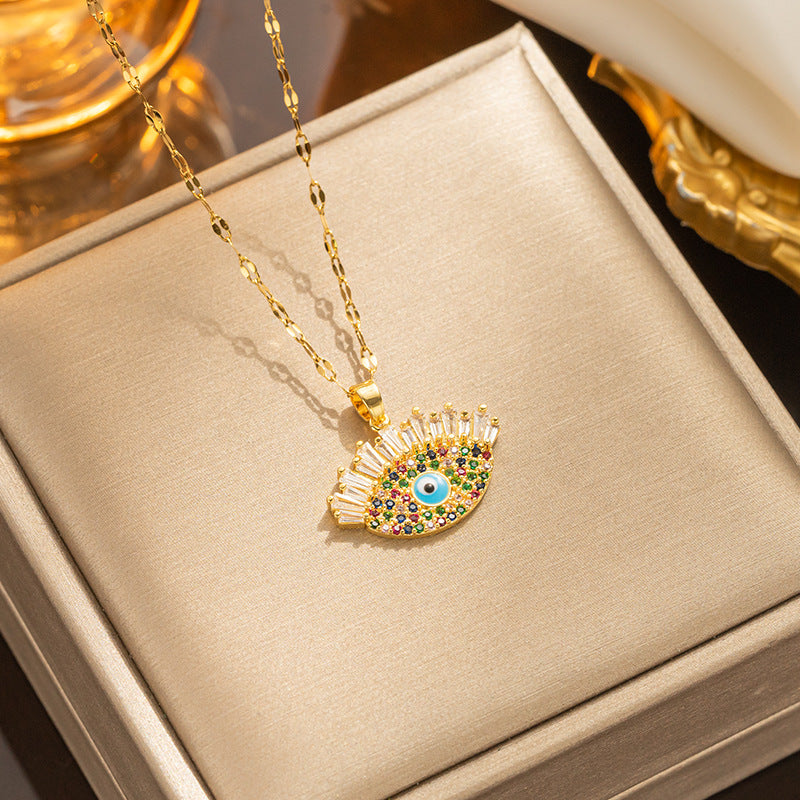 Fashionable Evil Eye Pendant Necklace for Women in Titanium Steel with Rhinestone Inlay and 18K Gold Plating on Wavy Chain