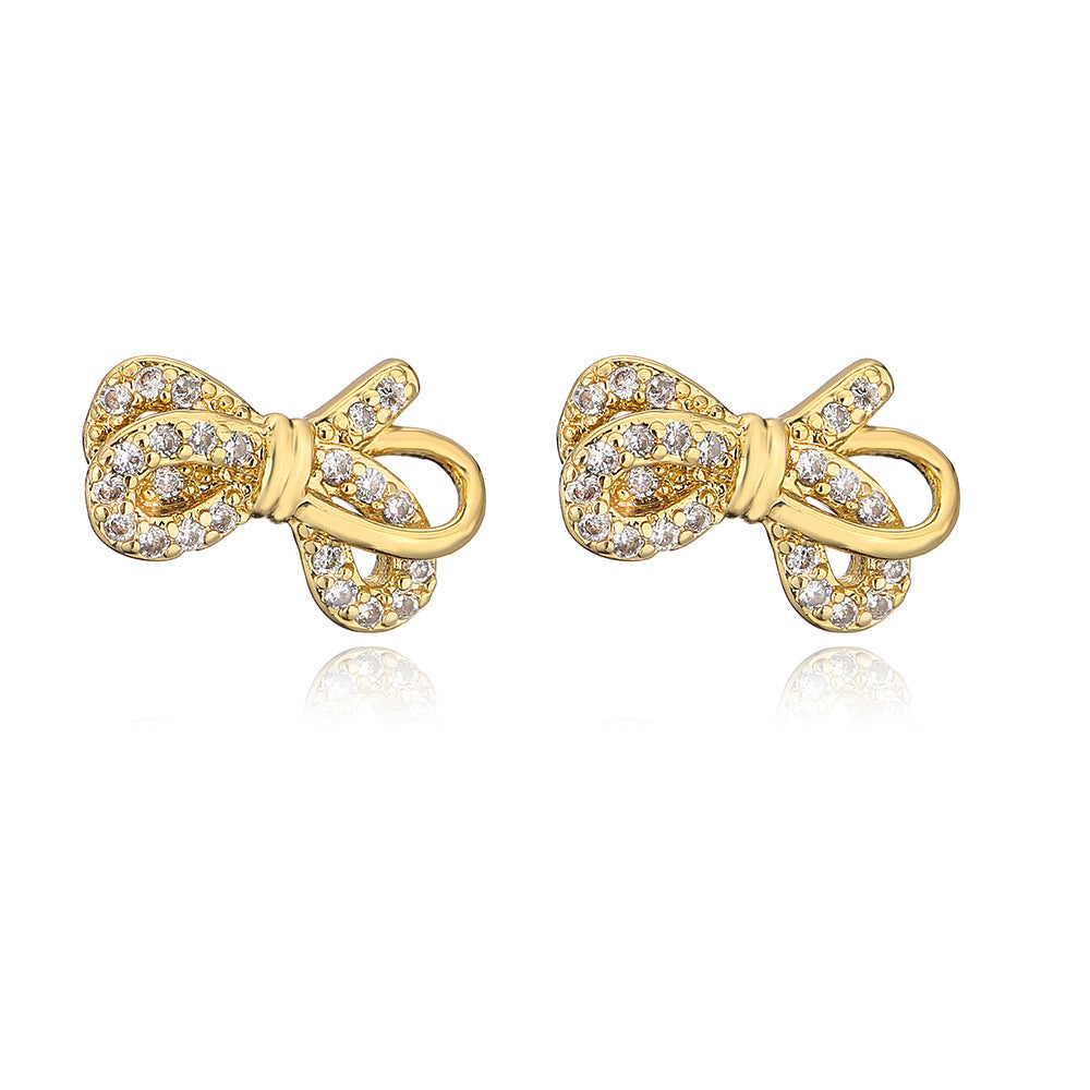 Minimalist Bowknot-Shaped Copper Earrings with 18K Gold Plating and Micro-Pavé Zirconia Eye Detail