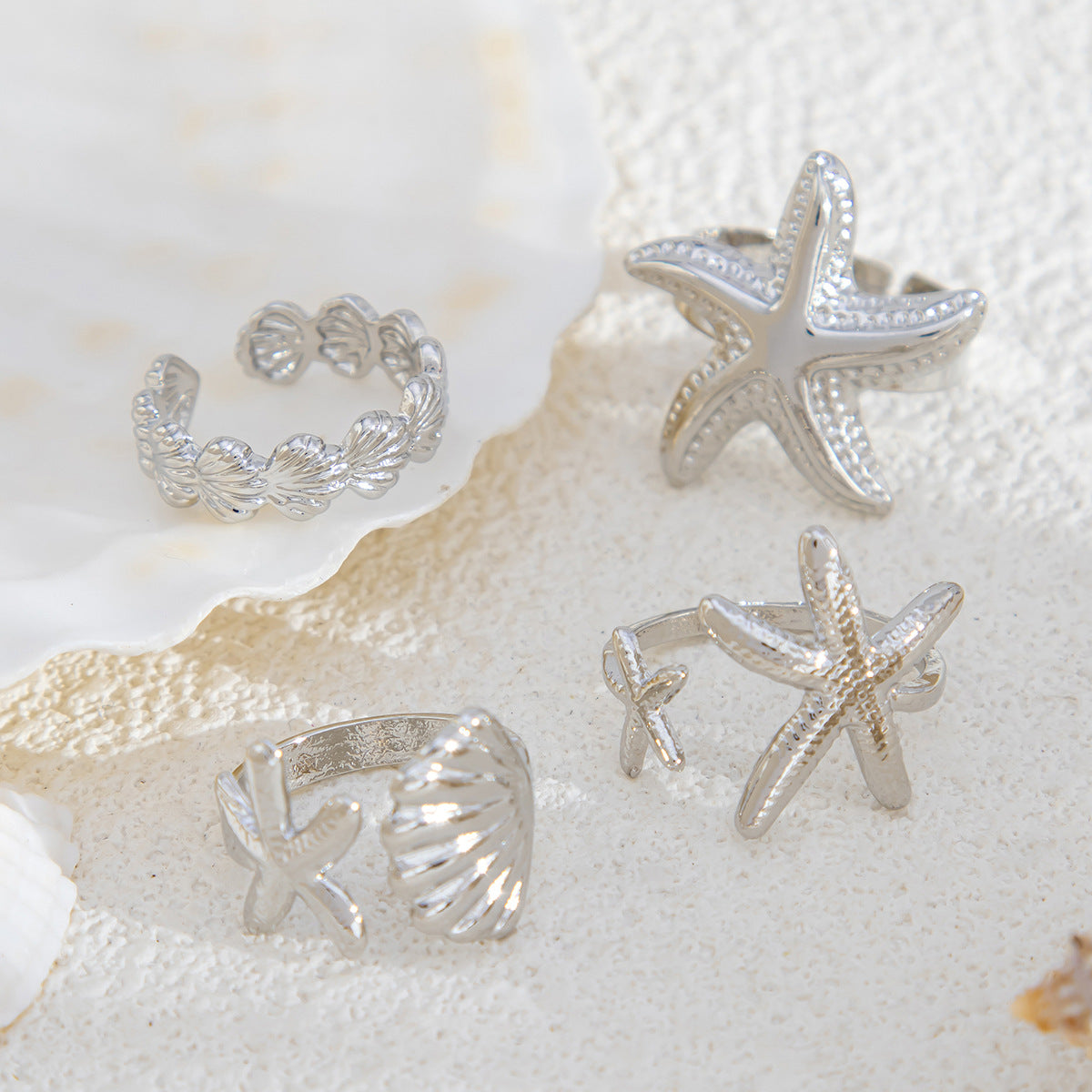 Anello da donna in metallo a forma di stella in stile vacanza con finitura placcata e fascia regolabile