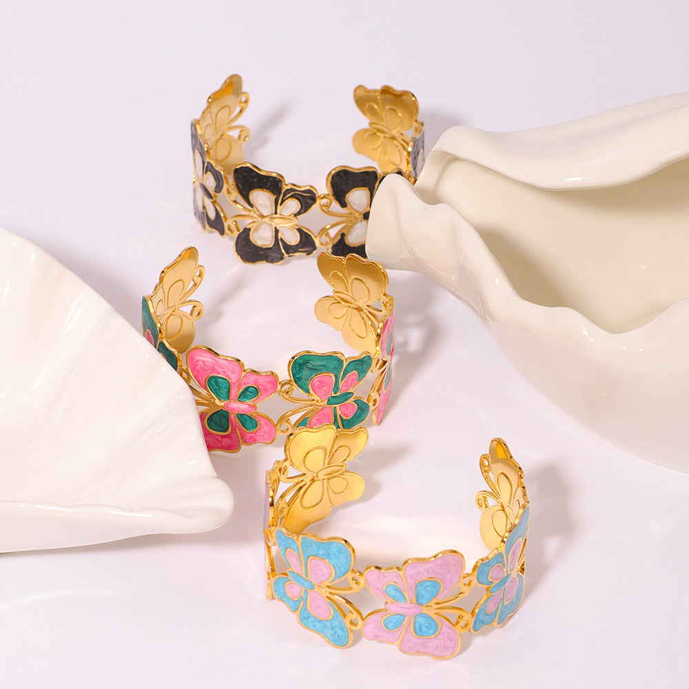 Bracciale rigido regolabile in acciaio inossidabile smaltato con placcatura in oro sottovuoto, motivo floreale geometrico e occhio di Fatima in stile vintage