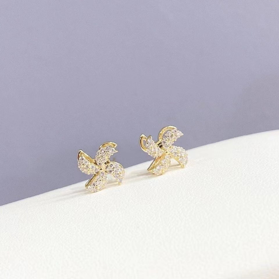 Rotatable Windmill Stud Earrings in Plated Copper with Geometric Octagonal Design for Women