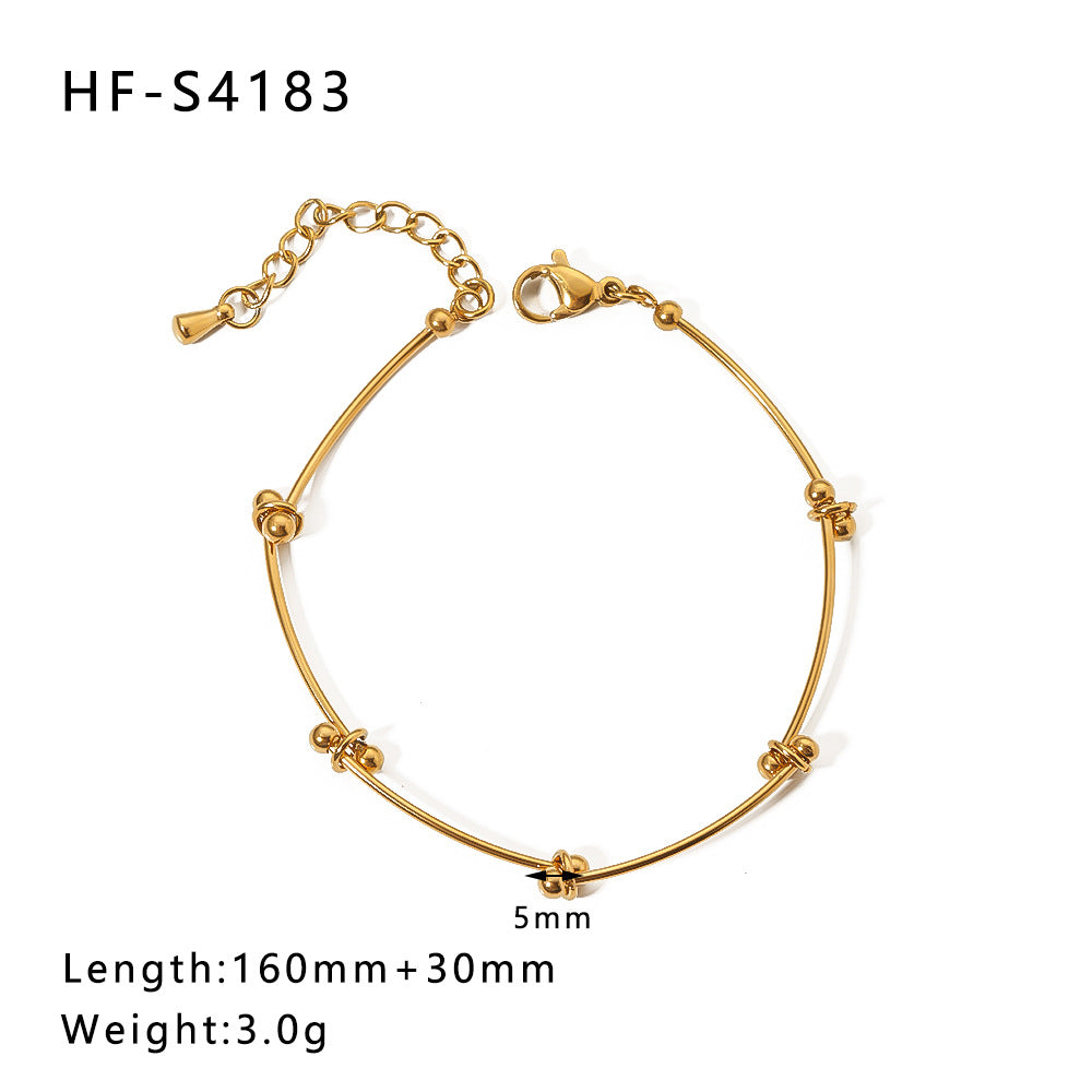 Bracciale vintage con farfalla e ciondolo rotondo in acciaio inossidabile con intarsio di strass e dettagli in perle