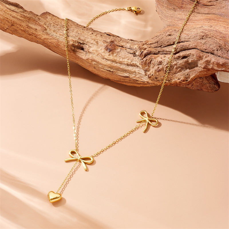 Minimalist Gold Plated Stainless Steel Bow and Tassel Pendant Necklace for Women