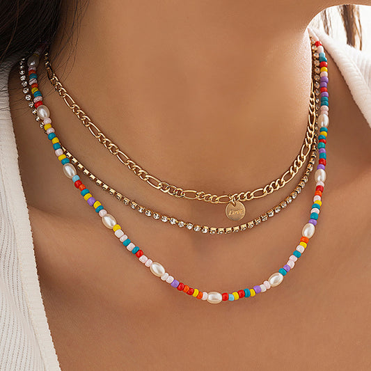 Collana con Ciondolo a Lettera Minimalista in Lega con Finitura Placcata e Design Multistrato