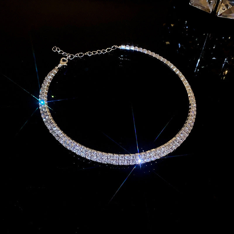 Collana con pendente a cuore a goccia in stile lusso con intarsio in strass in acciaio al titanio su catena in rame da donna