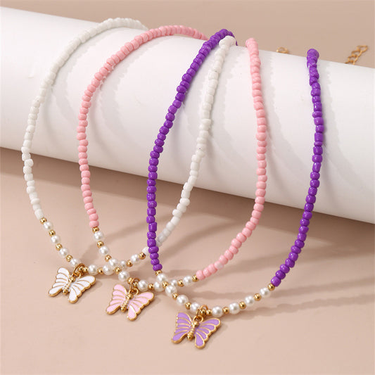Collar con colgante de mariposa esmaltado estilo bohemio con cuentas de vidrio para niños, cadena de cuentas redondas hecha a mano