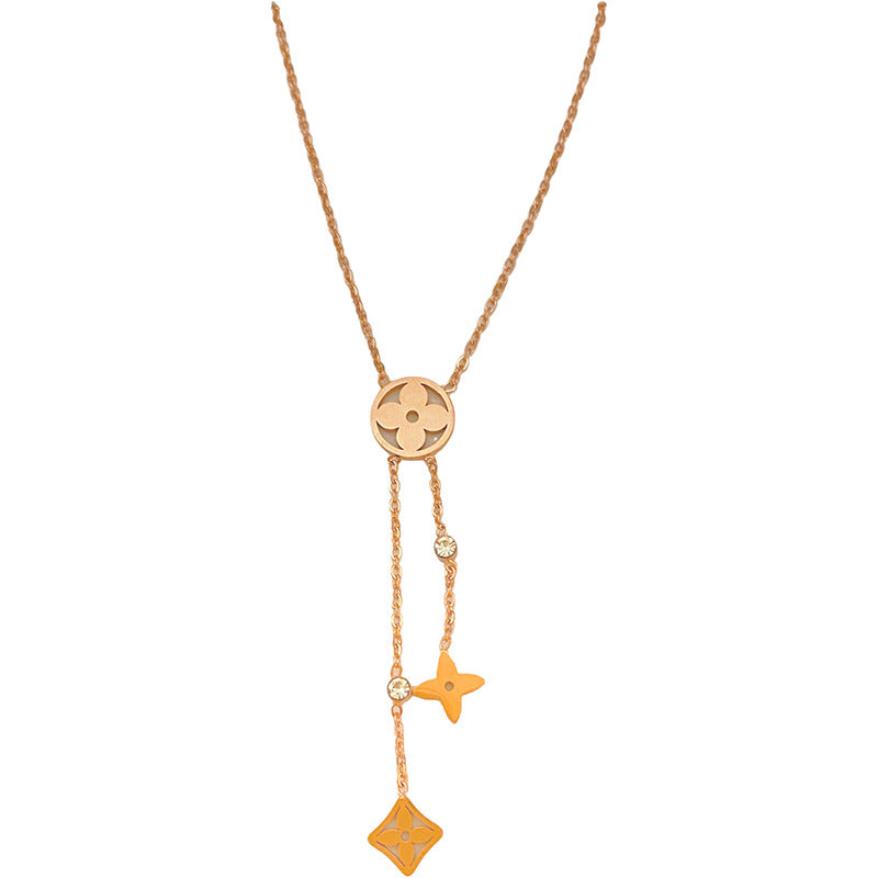 Minimalist Luxury Hollow Four-Leaf Clover Tassel Titanium Steel Necklace