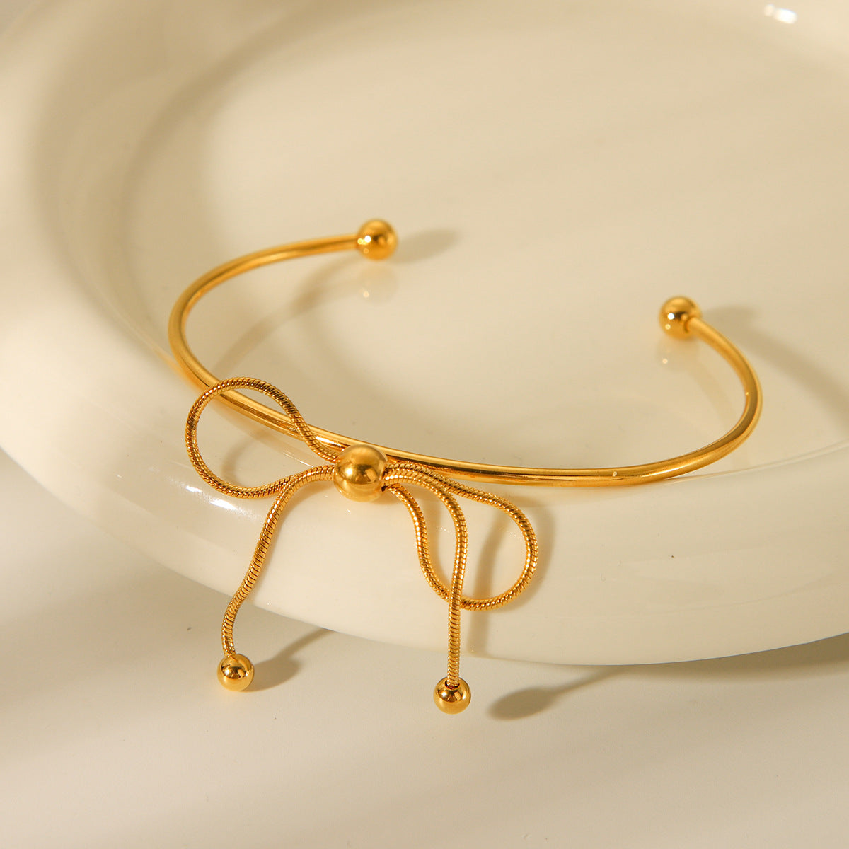 Fashionable 18K Gold Plated Stainless Steel Bow Knot Open Cuff Bracelet for Women