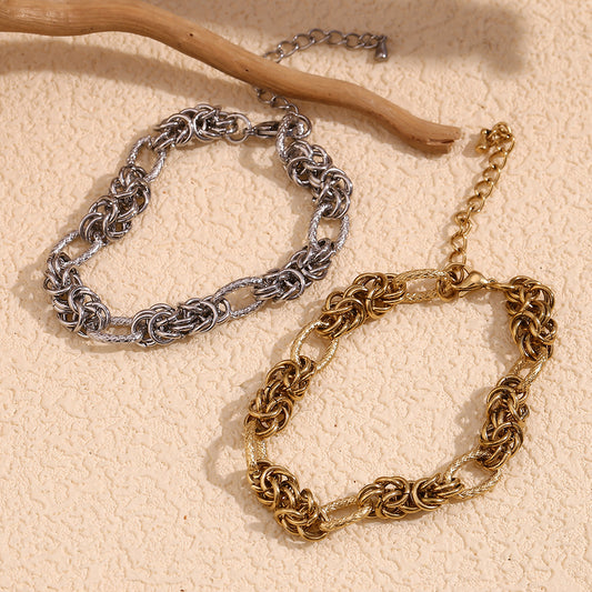 Cavigliera da donna minimalista geometrica in acciaio al titanio intrecciata a mano con placcatura in oro 14 carati