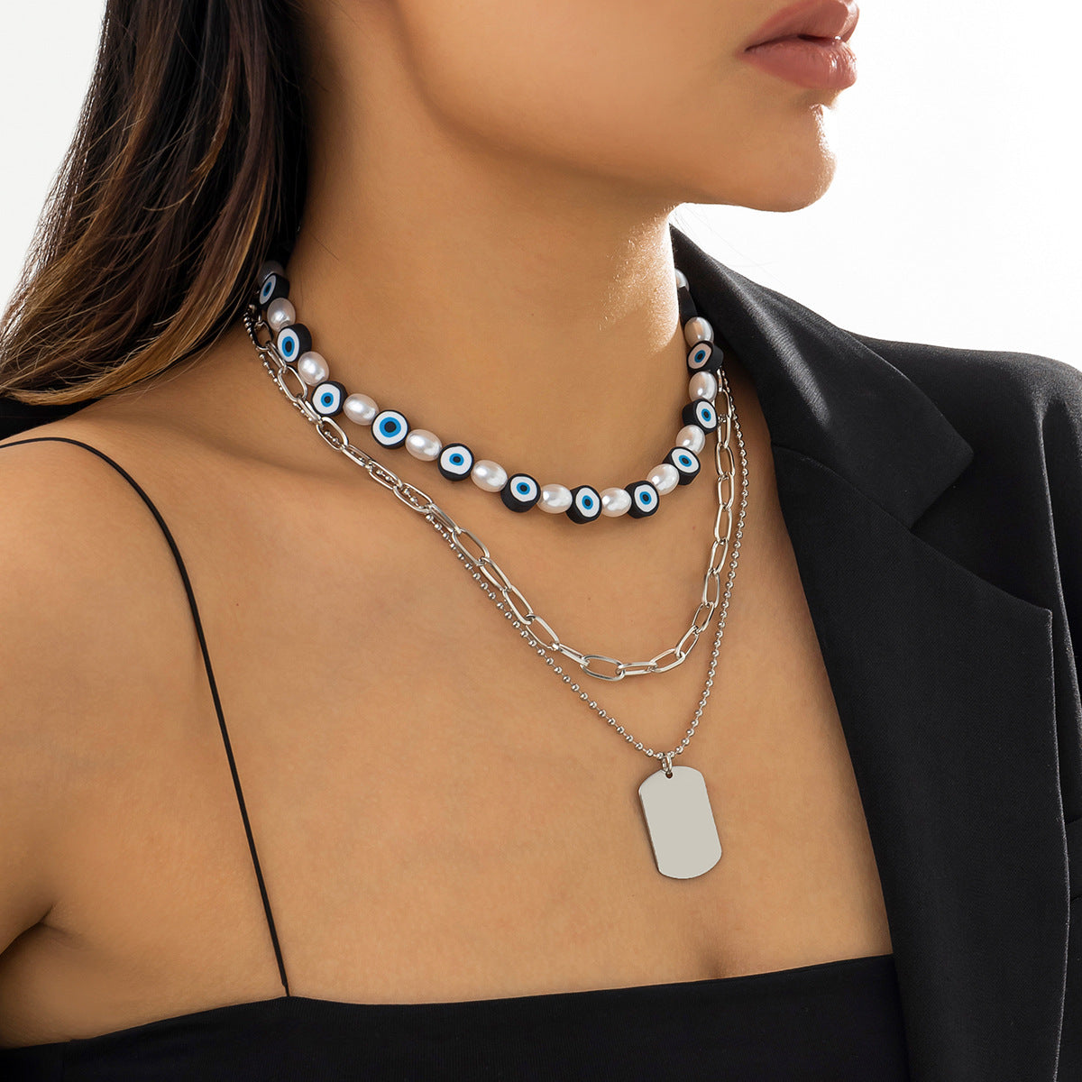 Minimalist Multi-Layer Necklace with Geometric Eye Pendant, Stainless Steel Chain, Tassel Accents, and Electroplated Finish