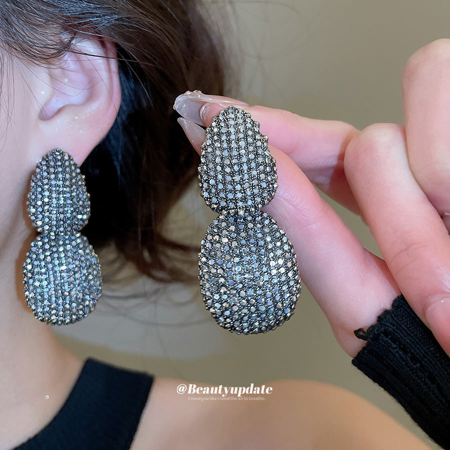 Orecchini a perno ovali geometrici vintage in lega con intarsio di strass da donna