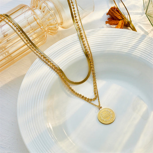 Fashionable Minimalist Titanium Steel Pendant Necklace with Multi-Layer Chain and Round Medallion Featuring Queen Portrait Design
