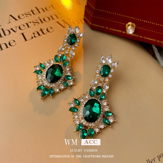 Pendientes vintage de óvalo de estrás verde esmeralda con postes de metal chapado y diseño geométrico para mujer