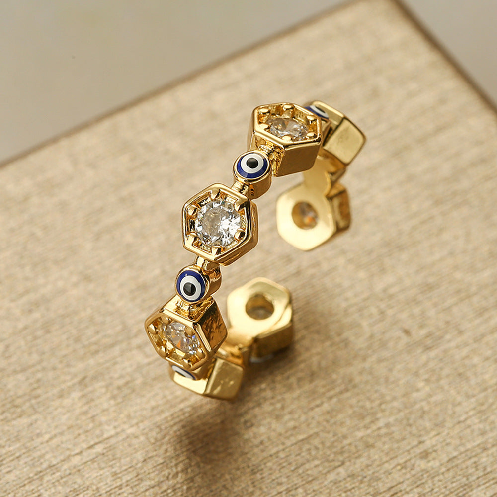 Anello da donna geometrico a forma di occhio, aperto, in rame placcato oro vero con intarsio in zirconi