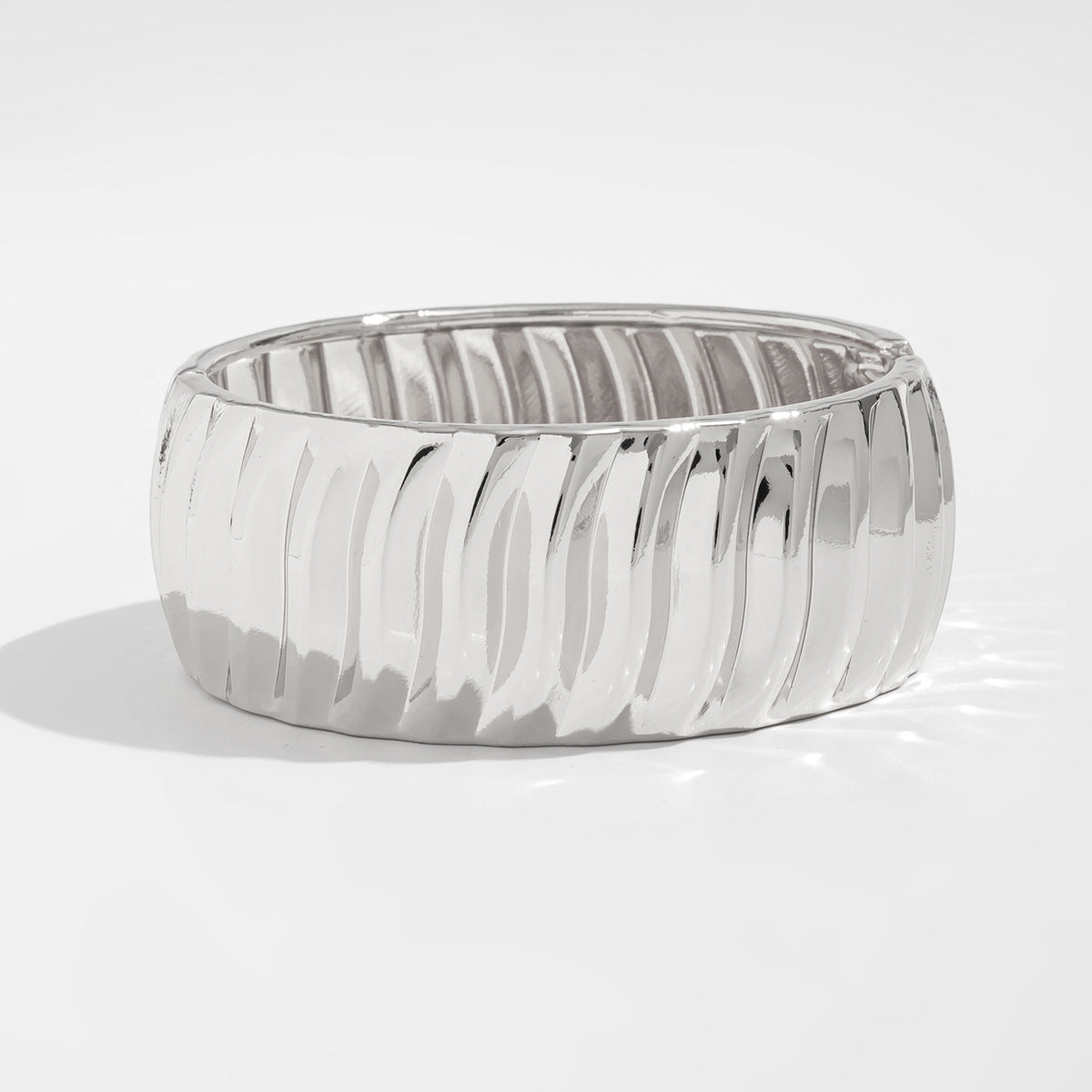 Twisted Water Wave Plated Zinc Alloy Spring Bangle Bracelet