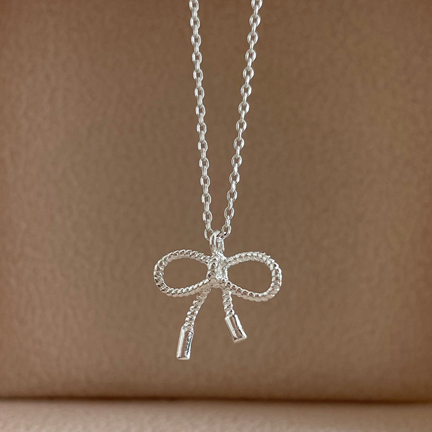 Minimalist Bow Knot Necklace in 925 Sterling Silver with Geometric Outline and Fresh Sweet Aesthetic