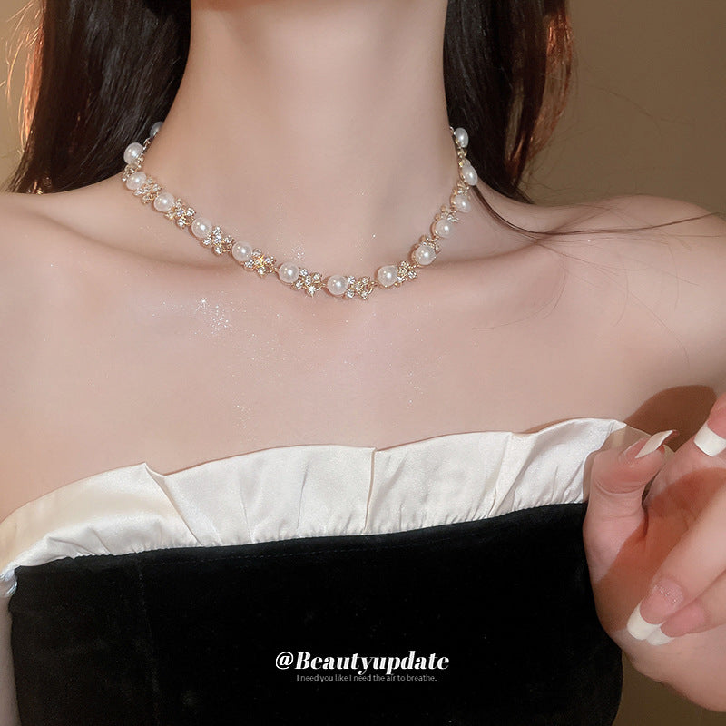 Elegante juego de collar redondo de perlas florales con incrustaciones de circonita para mujer, incluye pendientes, pulsera y cadena de clavícula